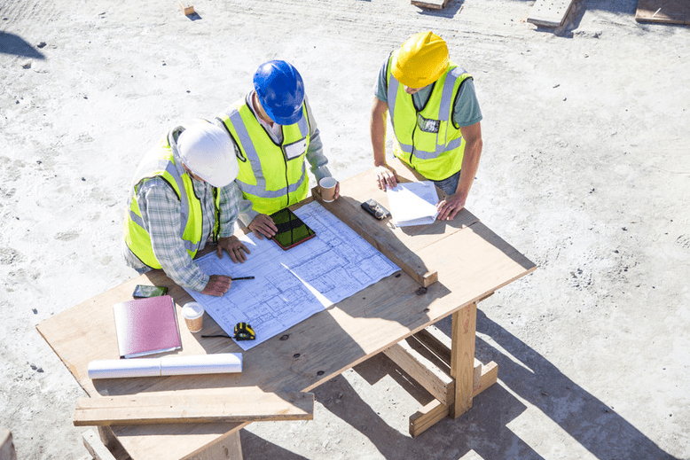 Workers Checking Blueprint